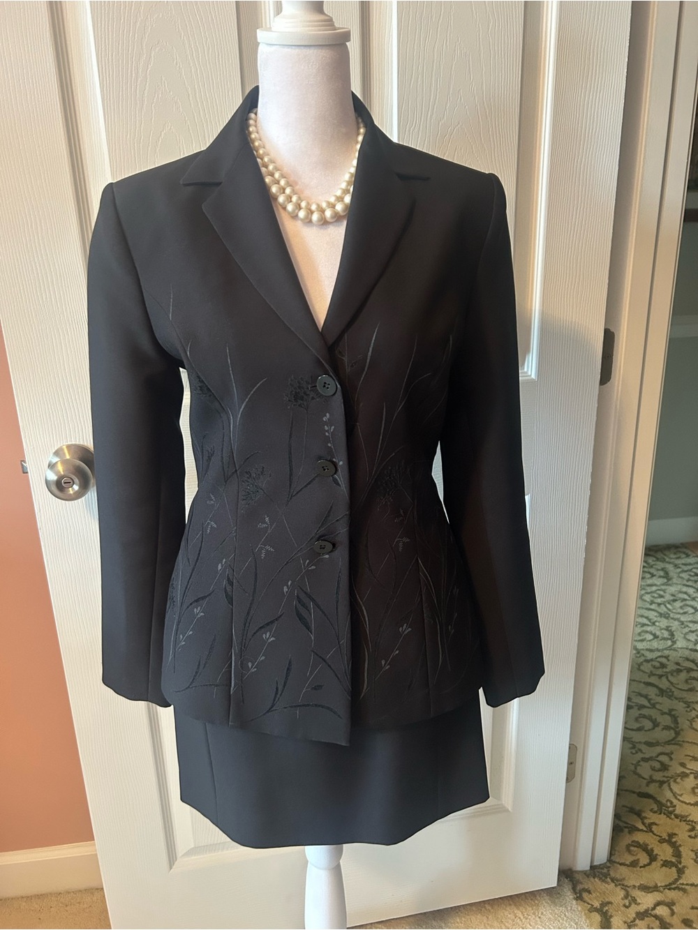 Elegant Black Women's Suit with Subtle Embossed Floral Design on Jacket